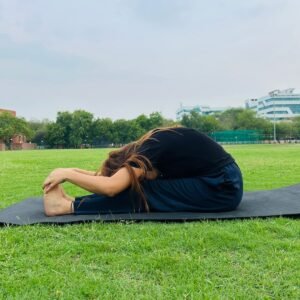 Girl Doing Paschimottanasana Yoga