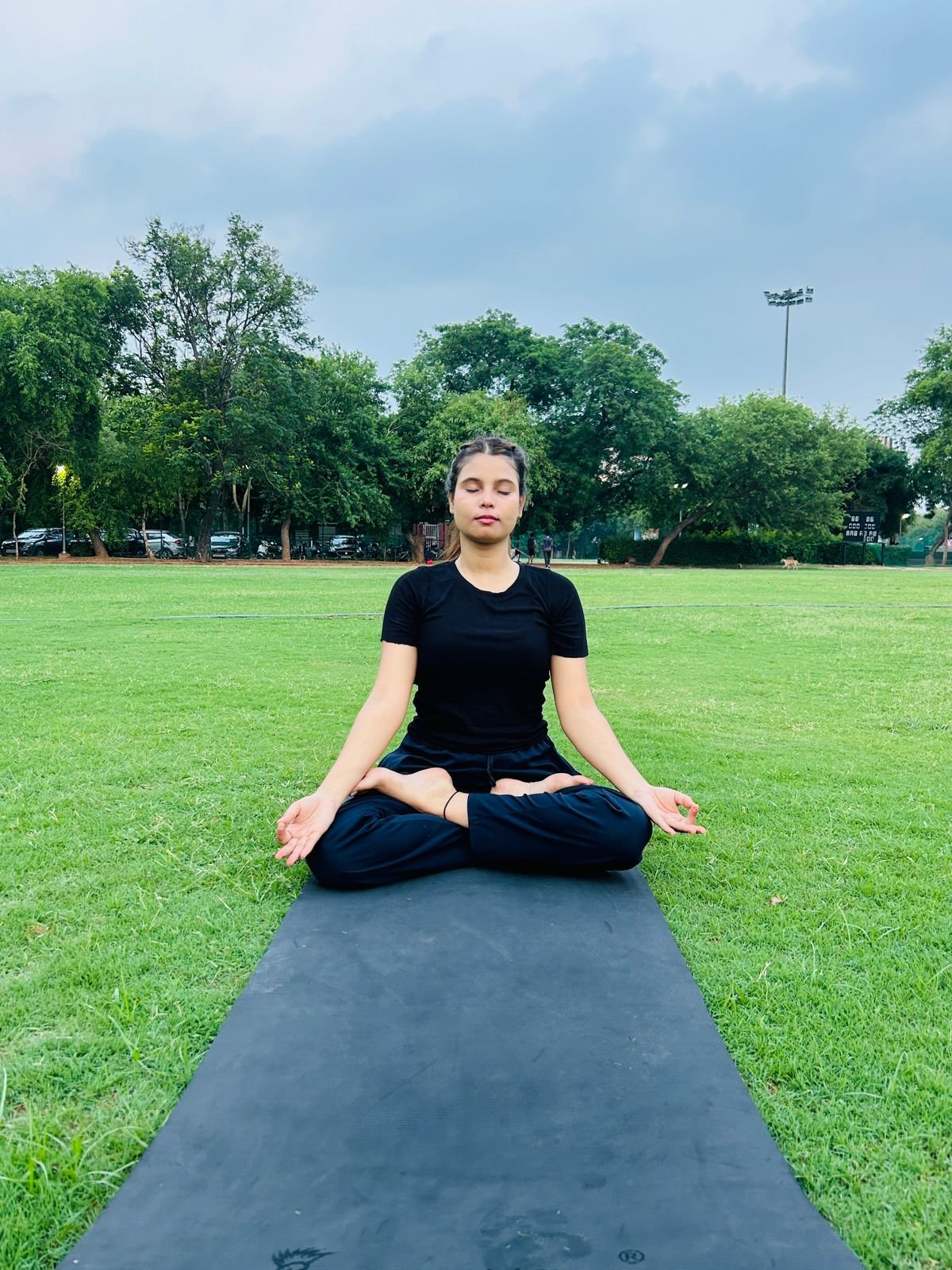 Girl Doing Seated Yoga Pose